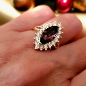 Silver tone marquise shaped purple gemstone